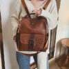 Mochila pequena vintage em imitação de pele