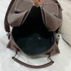 Mochila pequena vintage em imitação de pele