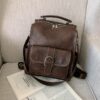 Mochila pequena vintage em imitação de pele